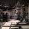 1-Bedroom Luxury Apartments in Savannah, GA - Aventon Victory - Fitness Center with Cardio Machines, Strength Training Machines, a Tall Ceiling with Ceiling Fans, and Large Windows